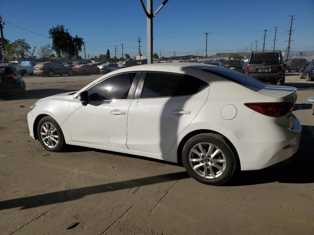 2015 Mazda 3 VIN JM1BM1V77F1248290 Copart auction photo, front end / side damage thumbnail 2