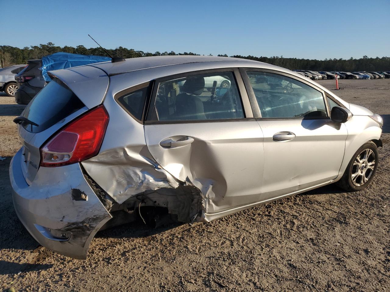 2014 Ford Fiesta VIN 3FADP4EJ1EM219386 Copart auction photo, undercarriage / all over damage thumbnail 3