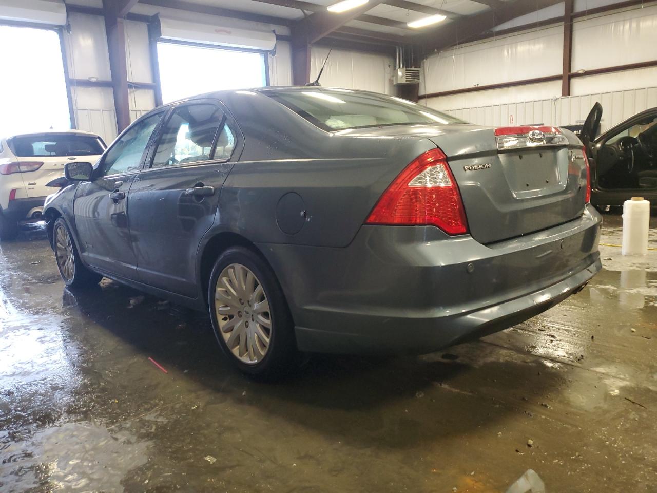 2012 Ford Fusion VIN 3FADP0L35CR219744 Copart auction photo, front end damage thumbnail 2
