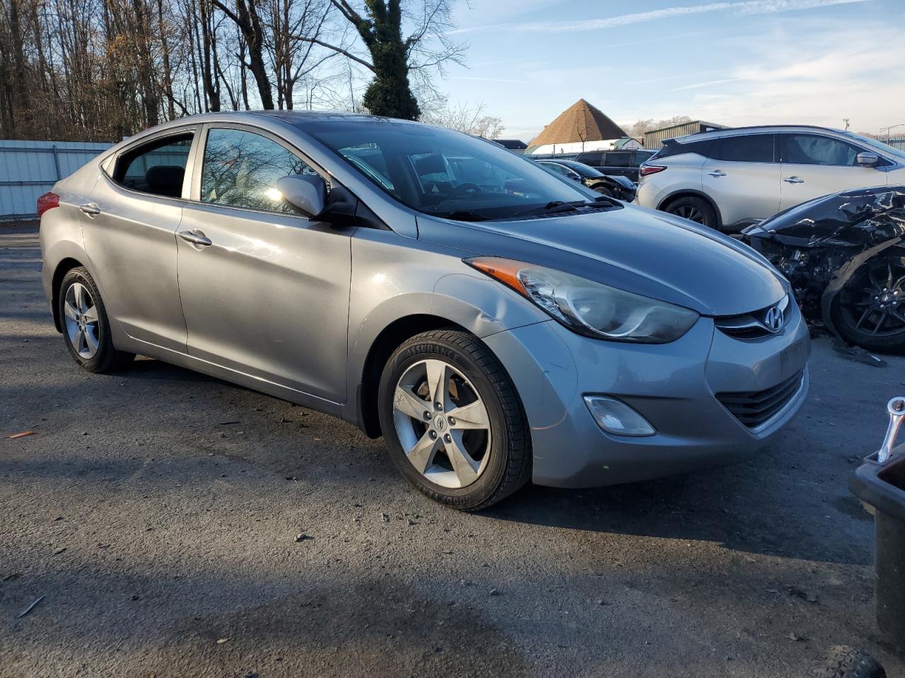 2012 Hyundai Elantra VIN KMHDH4AEXCU386401 Copart auction photo, vandalism damage thumbnail 4