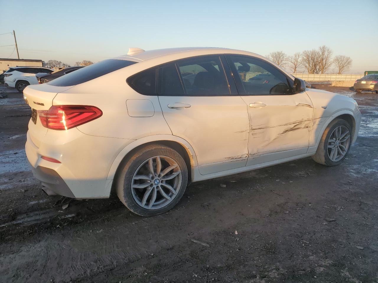 2017 BMW X4 VIN 5UXXW7C3XH0U26526 Copart auction photo, side / minor dent/scratches damage thumbnail 3