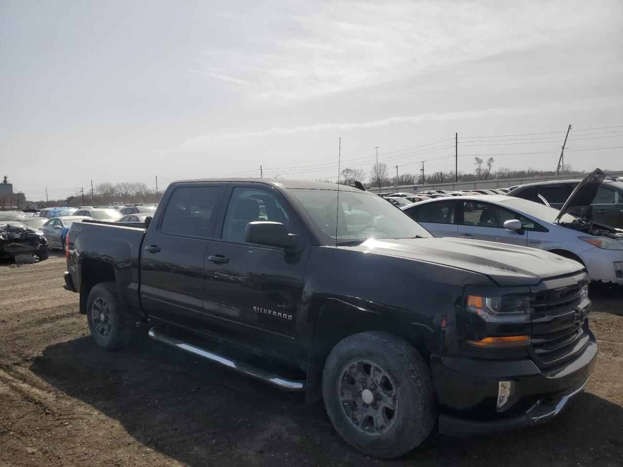 2016 Chevrolet Silverado VIN 3GCUKREC7GG166234 Copart auction photo, side / undercarriage damage thumbnail 4
