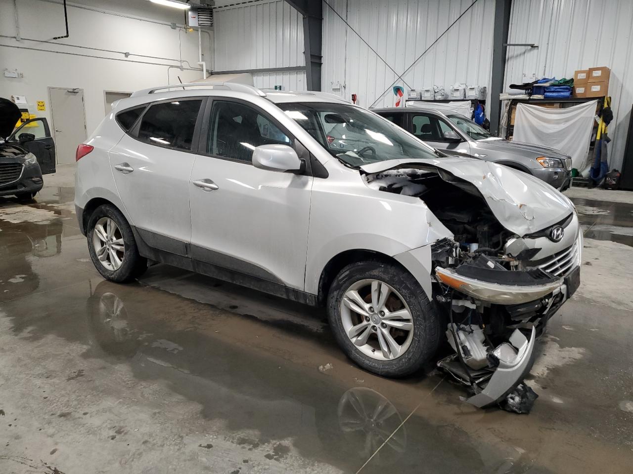 2012 Hyundai Tucson VIN KM8JU3AC6CU507609 Copart auction photo, front end / undercarriage damage thumbnail 4
