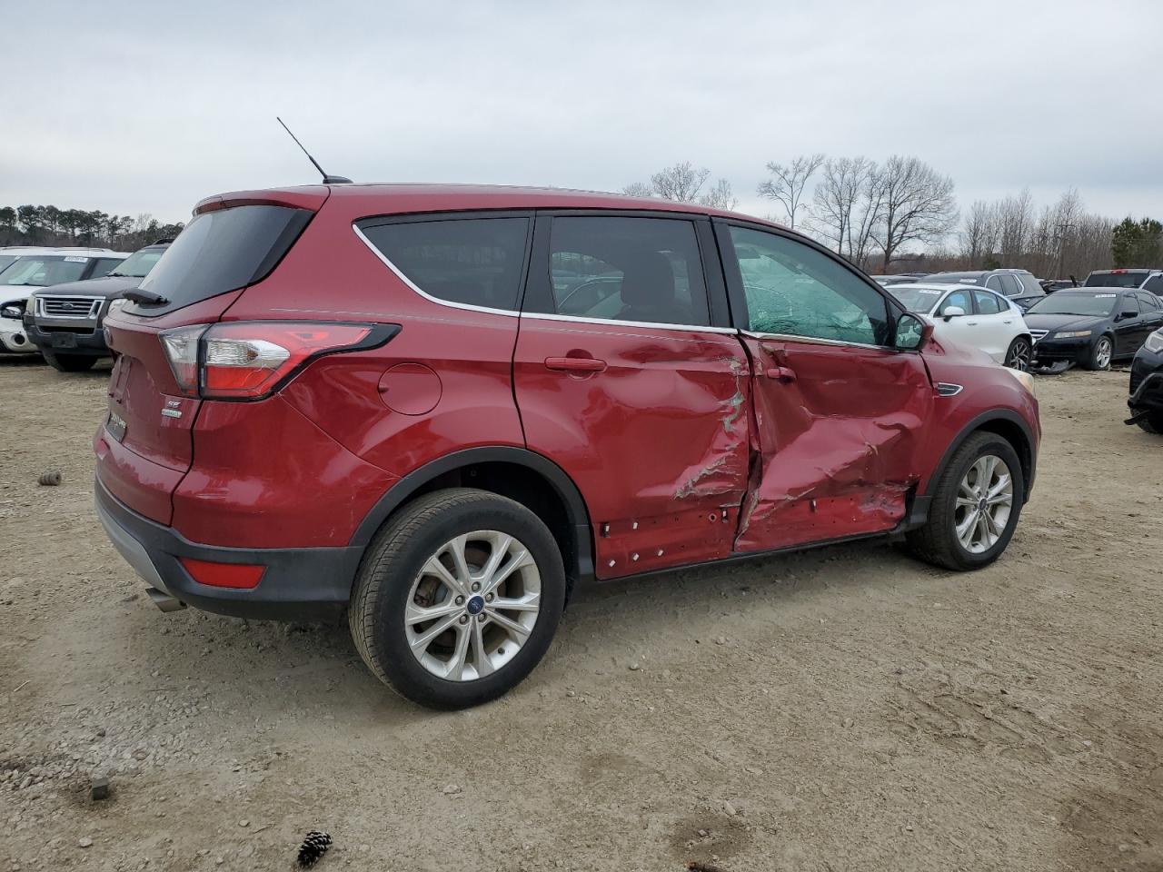 2017 Ford Escape VIN 1FMCU0GD4HUA74368 Copart auction photo, side / minor dent/scratches damage thumbnail 3