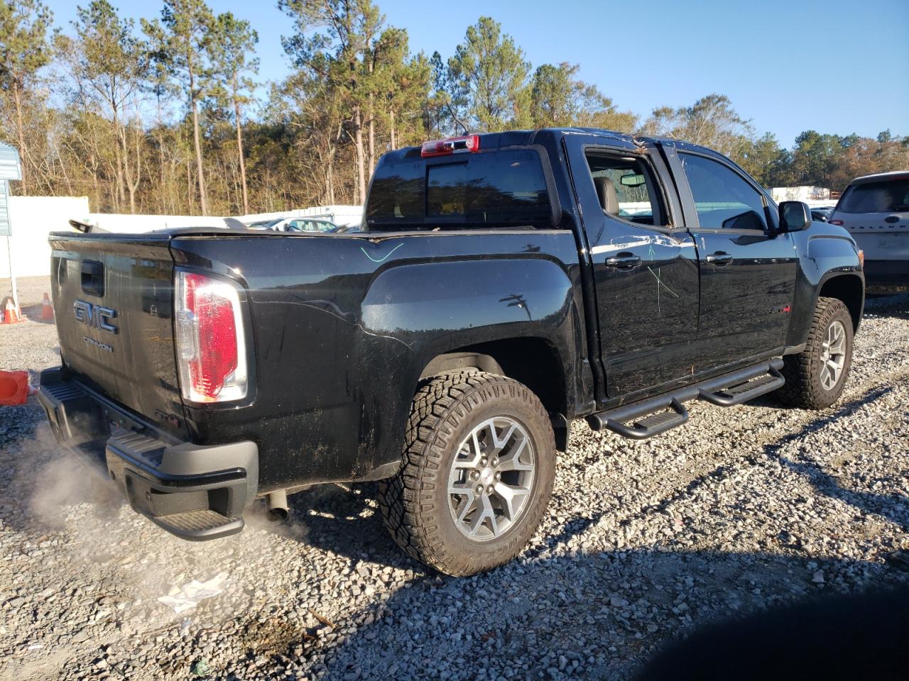 2022 GMC Canyon VIN 1GTG6FEN2N1182208 Copart auction photo, rear end / top/roof damage thumbnail 3