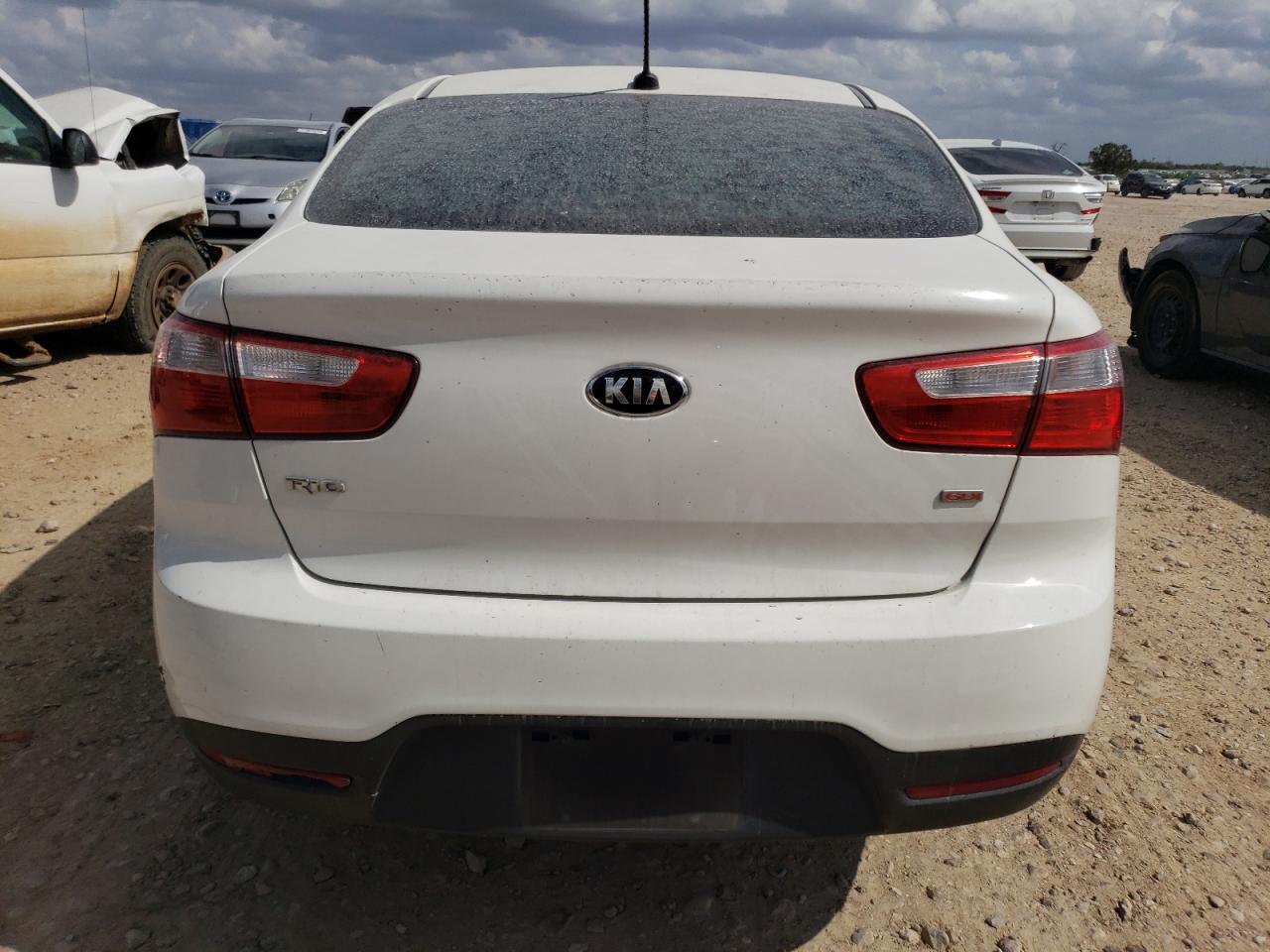 2015 KIA Rio VIN KNADM4A33F6453232 Copart auction photo, vandalism / minor dent/scratches damage thumbnail 6