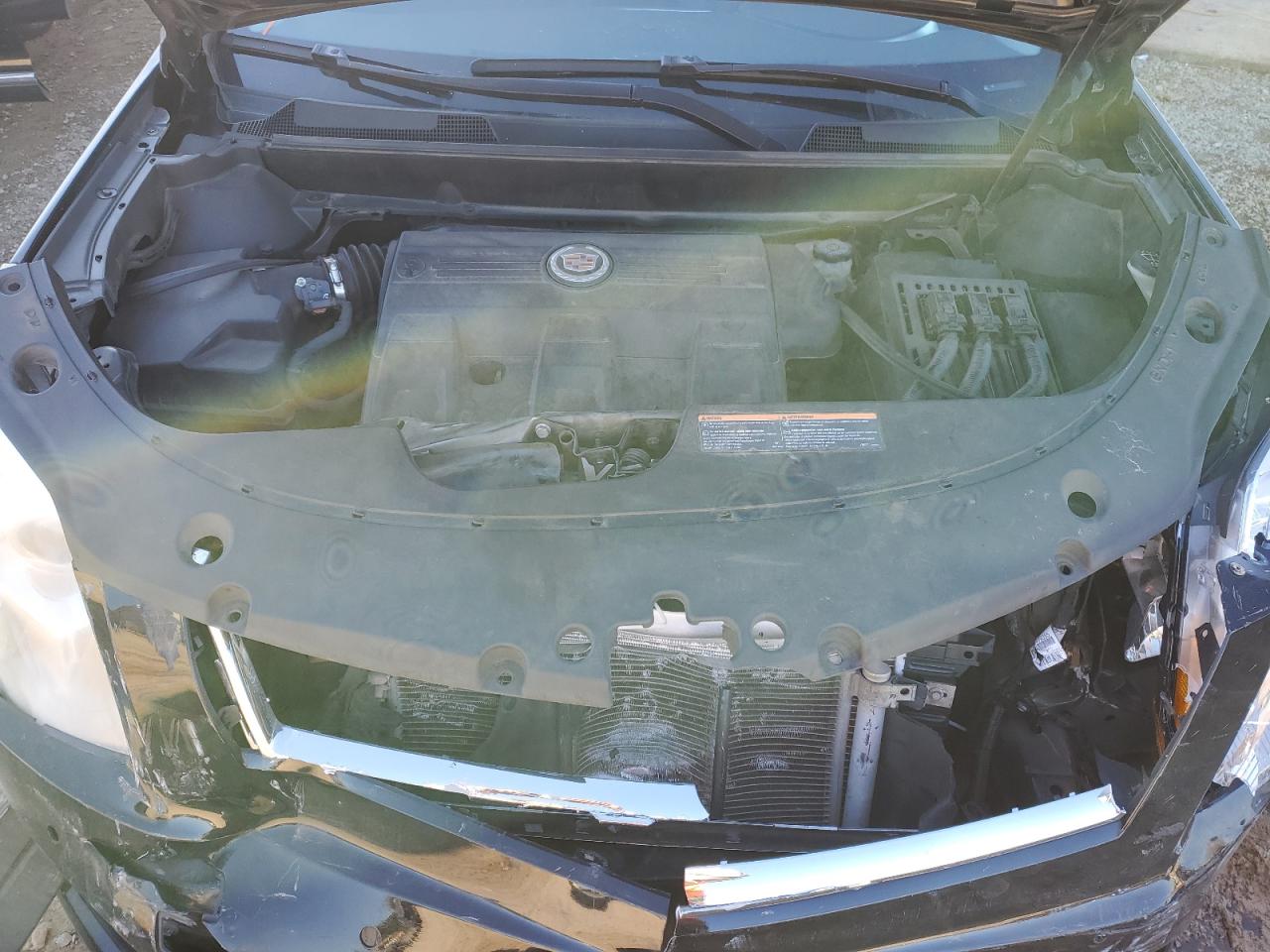 2015 Cadillac SRX VIN 3GYFNBE33FS623974 Copart auction photo, front end damage thumbnail 12