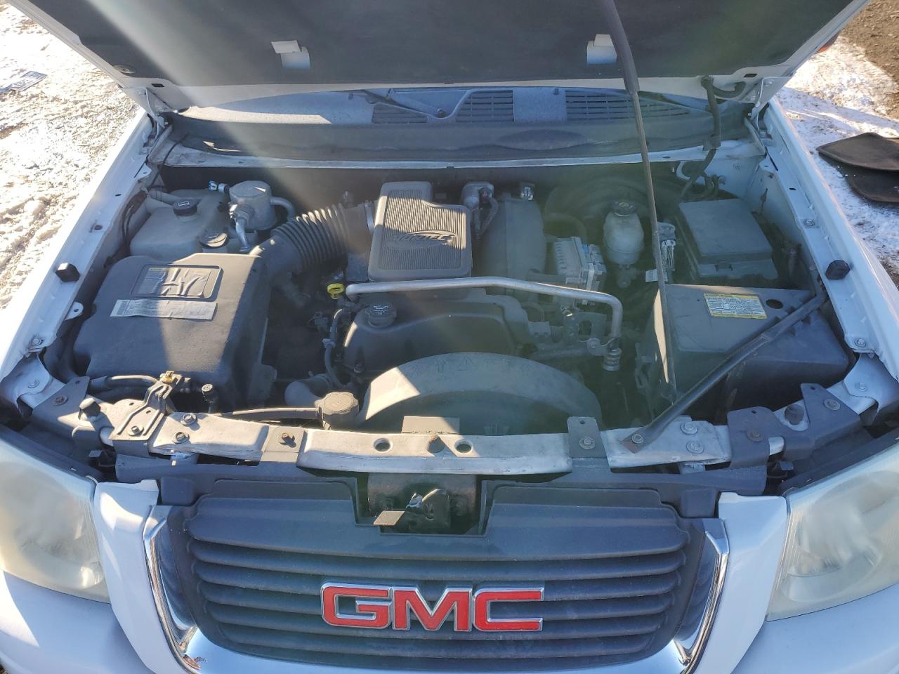 2005 GMC Envoy VIN 1GKDS13S052231236 Copart auction photo, rear end / side damage thumbnail 13