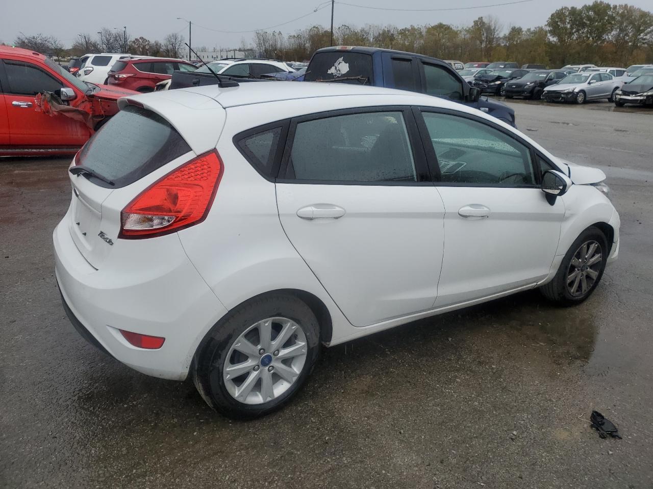2012 Ford Fiesta VIN 3FADP4EJ2CM125952 Copart auction photo, front end / side damage thumbnail 3