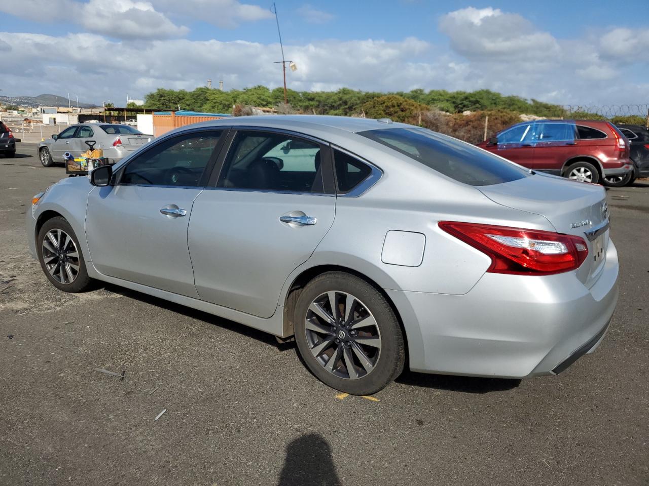 2016 Nissan Altima VIN 1N4AL3AP9GC153127 Copart auction photo, front end / side damage thumbnail 2