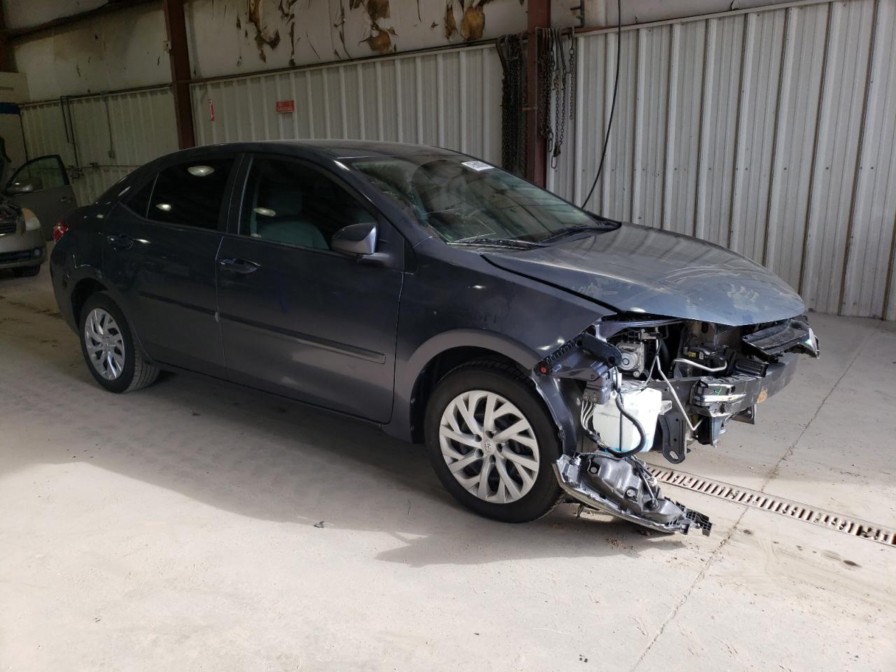 2018 Toyota Corolla VIN 5YFBURHE8JP778720 Copart auction photo, front end damage thumbnail 4