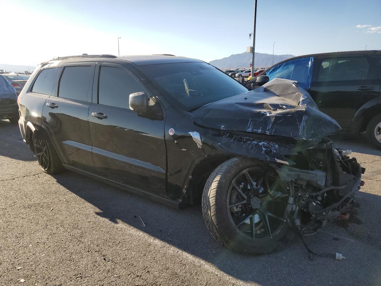 2018 Jeep Grand Cherokee VIN 1C4RJFLG1JC334540 Copart auction photo, front end / side damage thumbnail 4