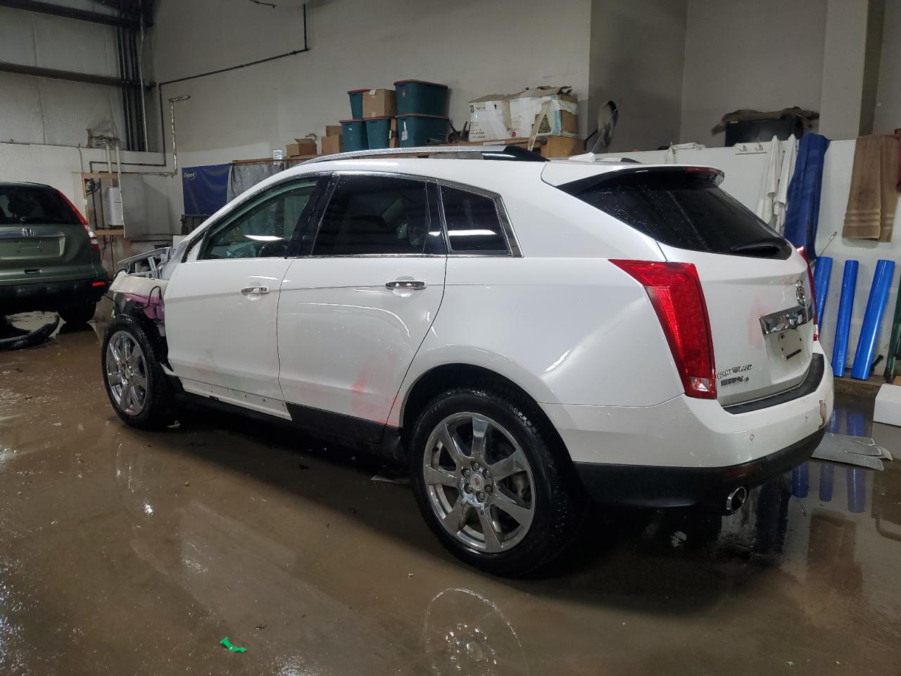 2010 Cadillac SRX VIN 3GYFNFEY5AS581805 Copart auction photo, front end / side damage thumbnail 2