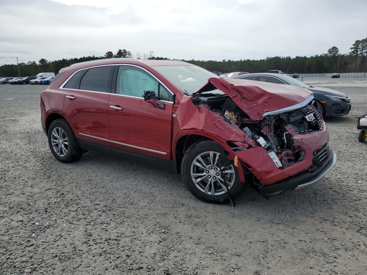 2022 Cadillac XT5 VIN 1GYKNCRS9NZ130520 Copart auction photo, front end damage thumbnail 4