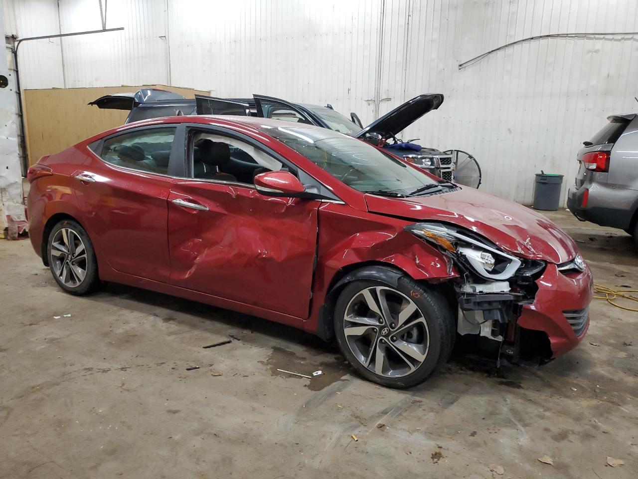 2015 Hyundai Elantra VIN 5NPDH4AE9FH552961 Copart auction photo, front end / side damage thumbnail 4