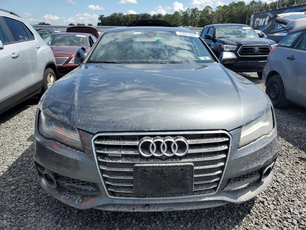 2014 Audi A7 VIN WAU2GAFC3EN016714 Copart auction photo, water/flood damage thumbnail 5
