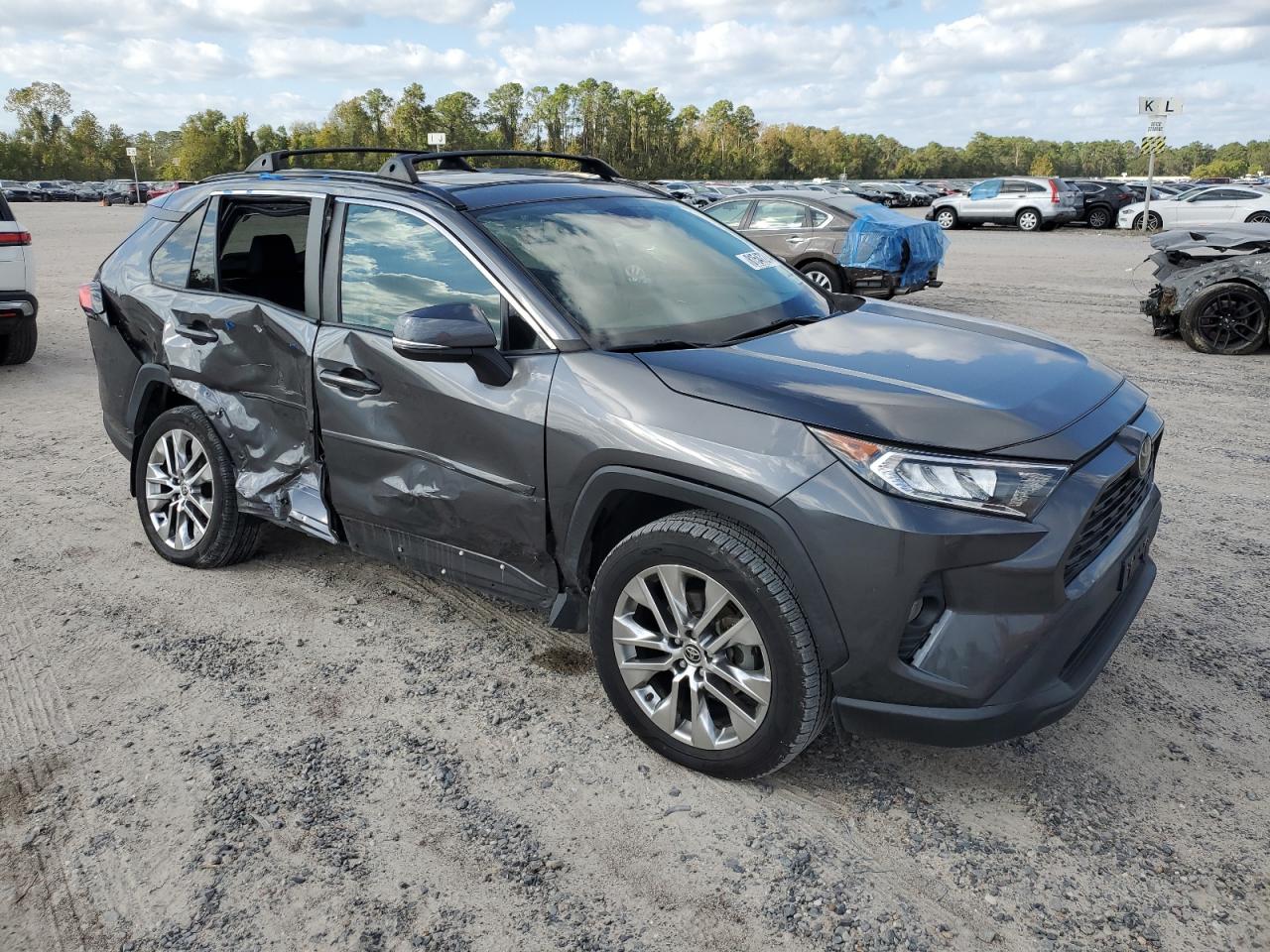 2021 Toyota RAV 4 VIN 2T3C1RFV0MC108610 Copart auction photo, side / all over damage thumbnail 4