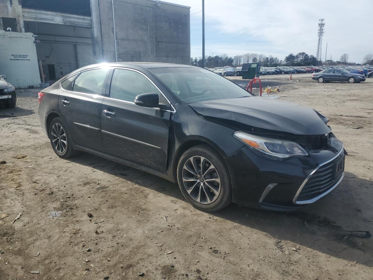 2016 Toyota Avalon VIN 4T1BK1EB0GU221227 Copart auction photo, front end / minor dent/scratches damage thumbnail 4