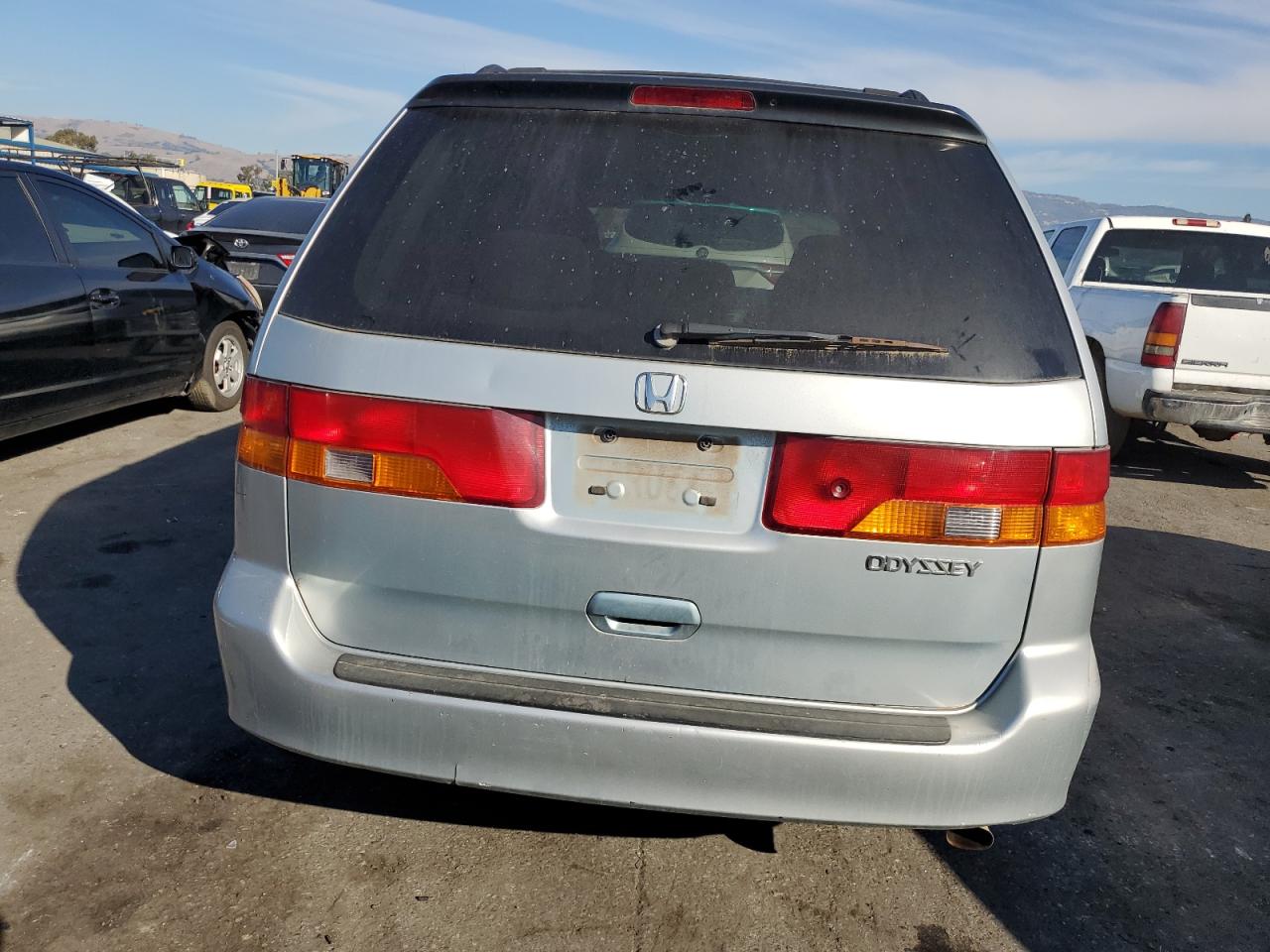 2002 Honda Odyssey VIN 2HKRL18692H585549 Copart auction photo, undercarriage / side damage thumbnail 6