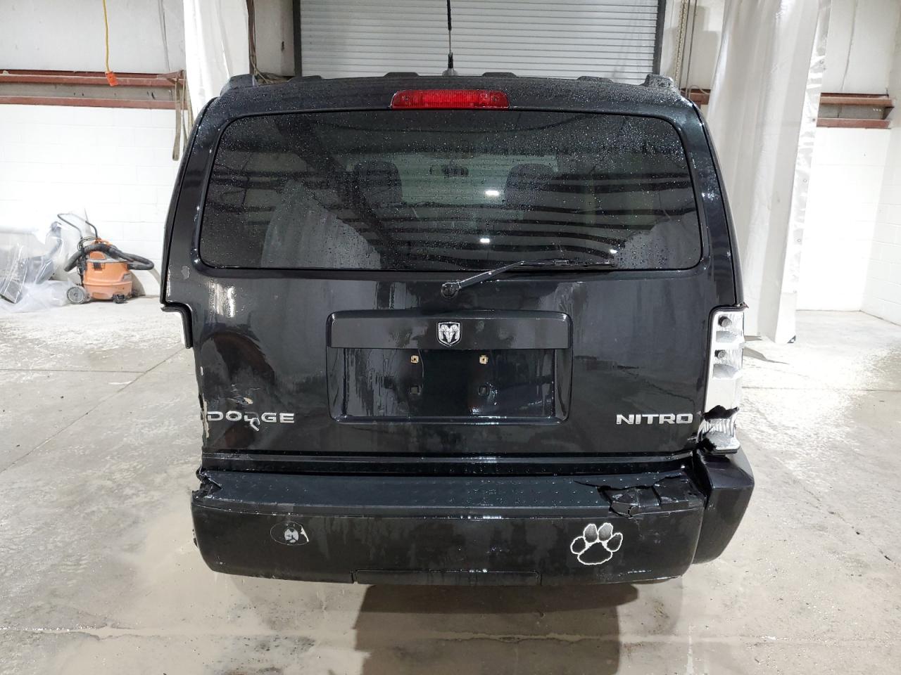 2010 Dodge Nitro VIN 1D4PU2GK5AW152427 Copart auction photo, side / rear end damage thumbnail 6