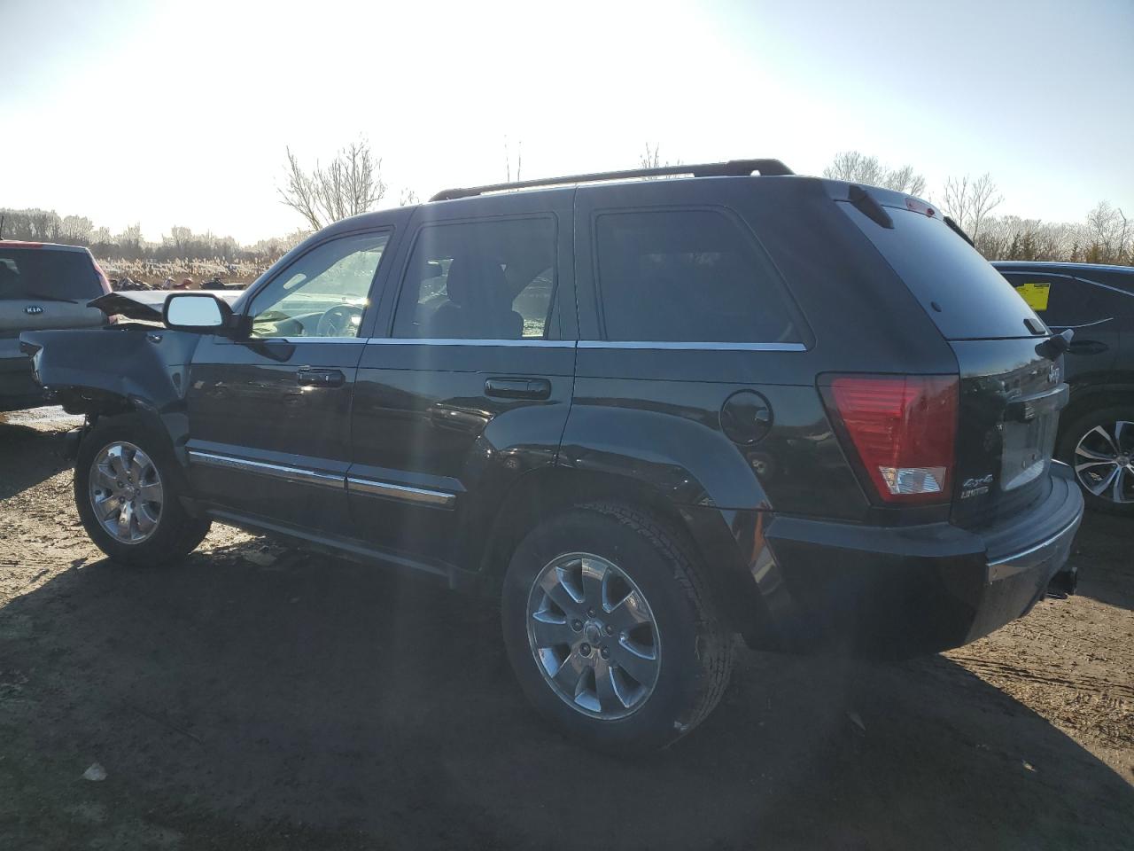 2009 Jeep Grand Cherokee VIN 1J8HR58P79C521857 Copart auction photo, front end / side damage thumbnail 2
