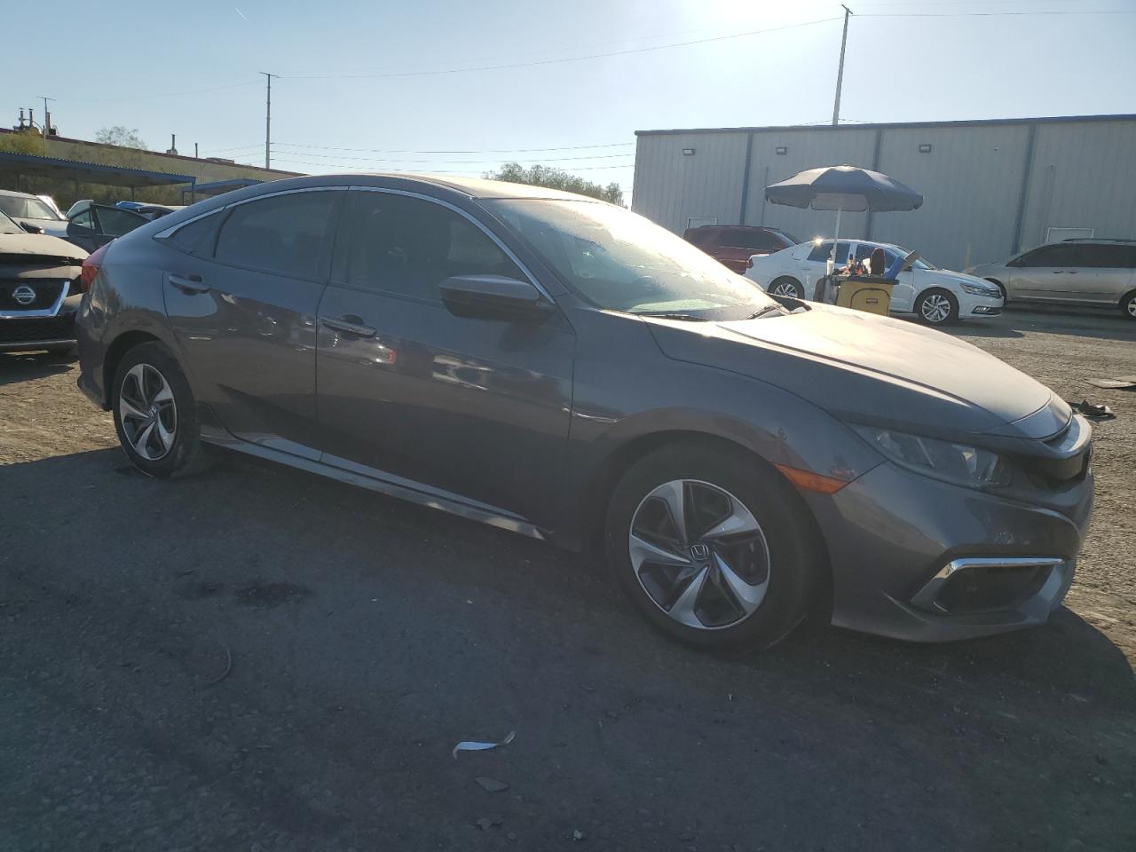 2019 Honda Civic VIN 19XFC2F65KE045907 Copart auction photo, side damage thumbnail 4