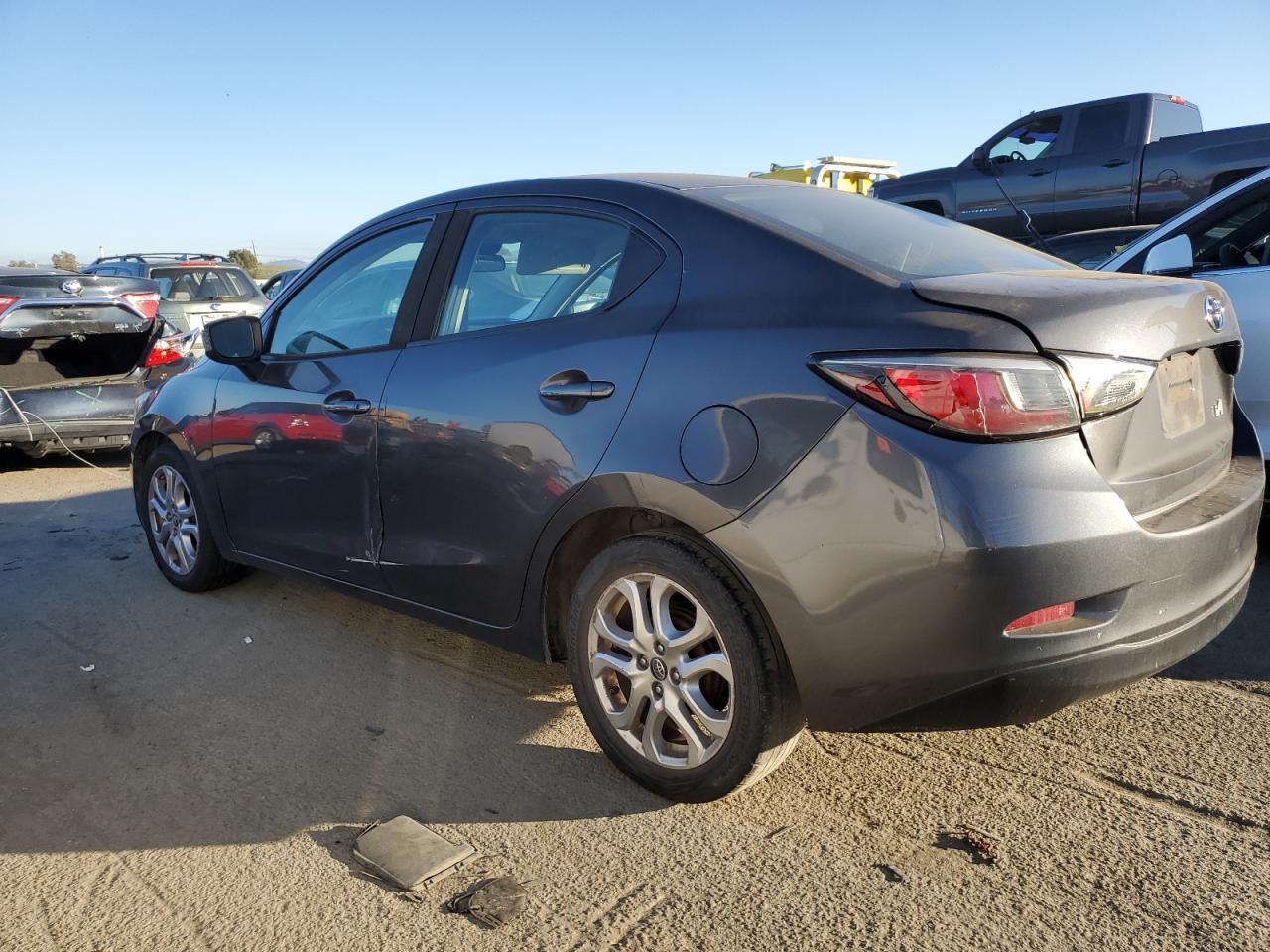 2017 Toyota Yaris VIN 3MYDLBYV7HY185218 Copart auction photo, side damage thumbnail 2