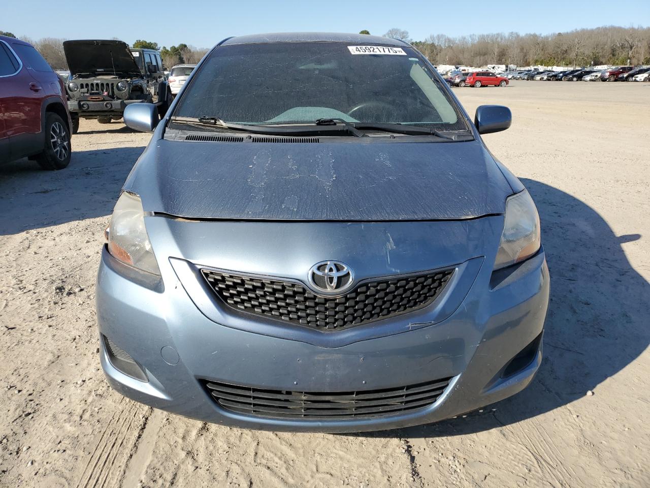 2010 Toyota Yaris VIN JTDBT4K37A1379945 Copart auction photo, front end / minor dent/scratches damage thumbnail 5