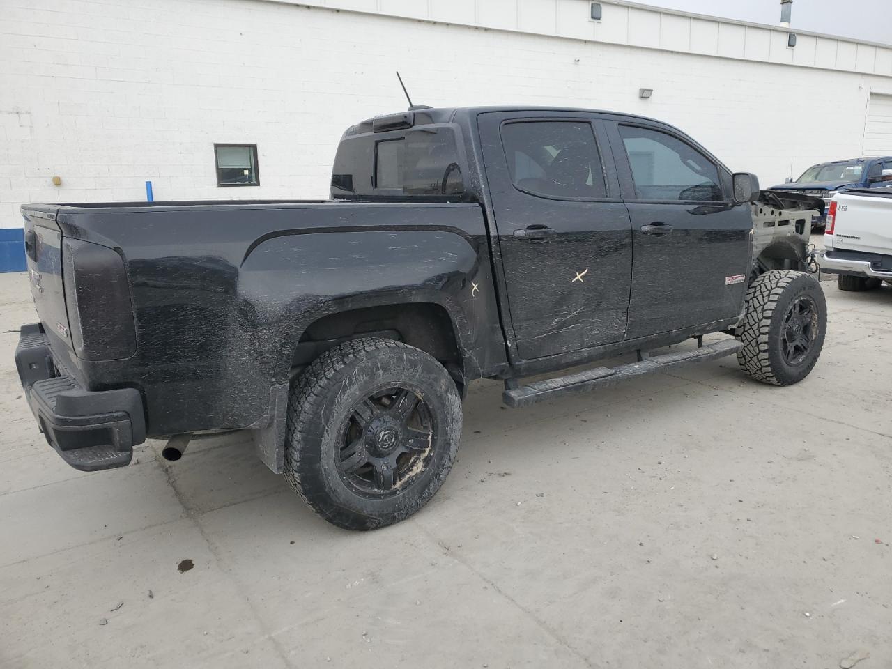 2016 GMC Canyon VIN 1GTG6CE39G1285660 Copart auction photo, front end / side damage thumbnail 3