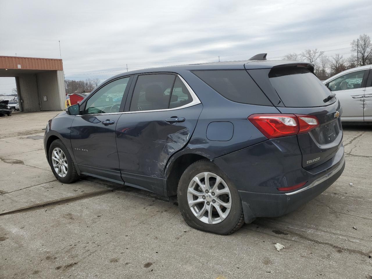 2018 Chevrolet Equinox VIN 3GNAXJEV9JL101897 Copart auction photo, side / rear end damage thumbnail 2