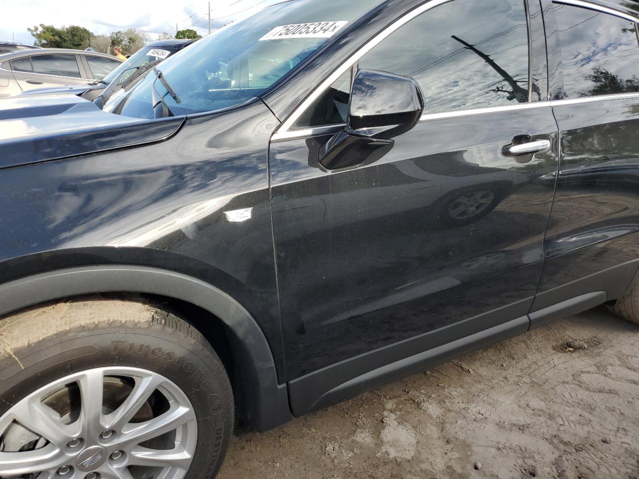 2021 Cadillac XT4 VIN 1GYAZAR40MF050786 Copart auction photo, water/flood damage thumbnail 12