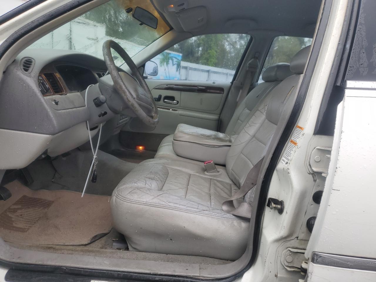 1999 Lincoln Town Car VIN 1LNHM81WXXY716663 Copart auction photo, side damage thumbnail 7