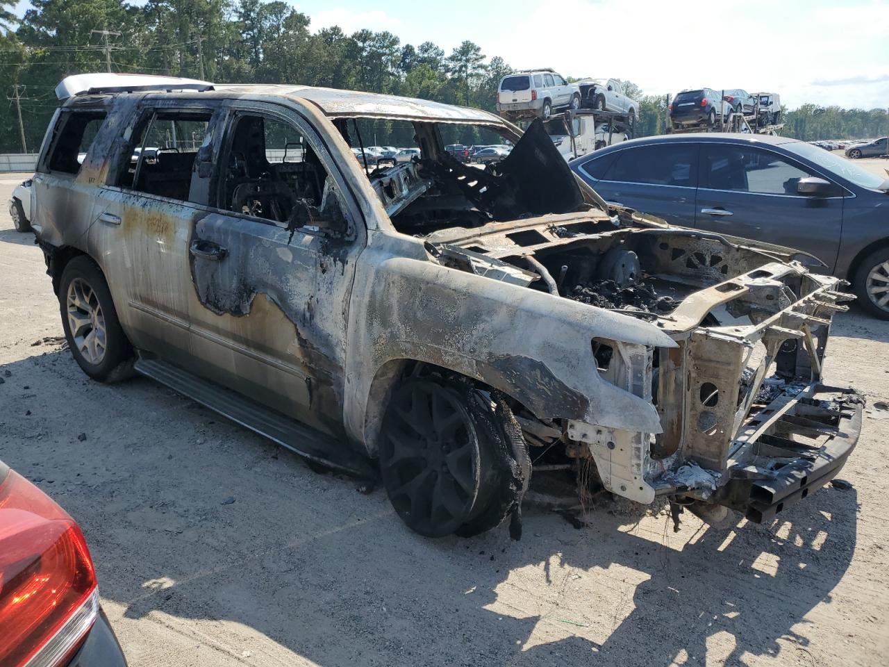 2015 Chevrolet Tahoe VIN 1GNSCCKC9FR239681 Copart auction photo, burn damage thumbnail 4