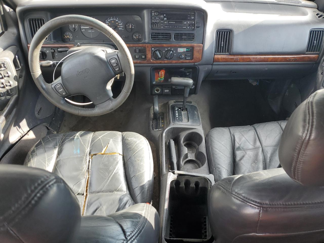 1997 Jeep Grand Cherokee VIN 1J4GZ78Y0VC556381 Copart auction photo, side / undercarriage damage thumbnail 8