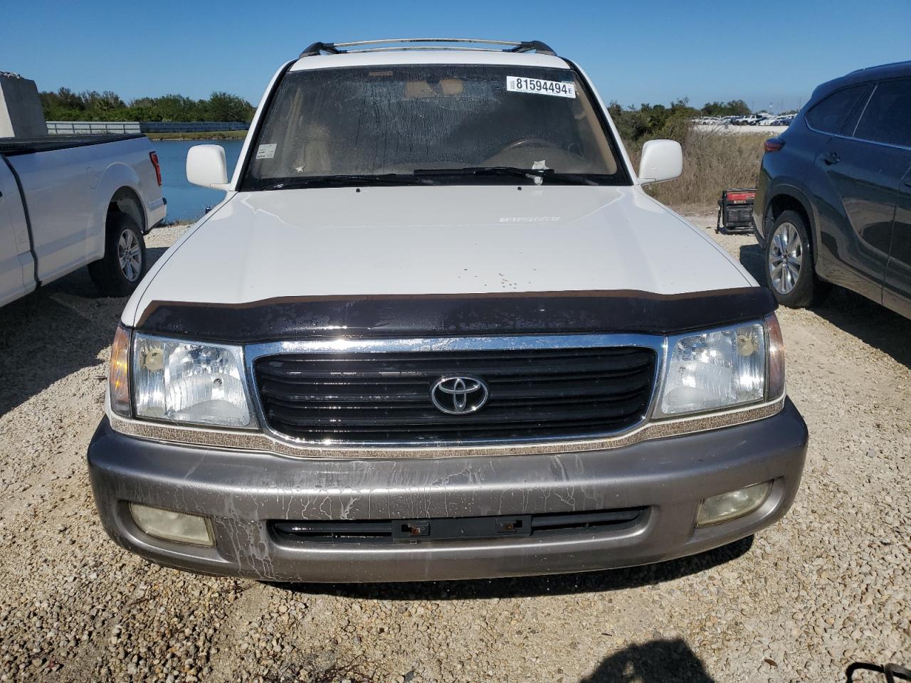 2001 Toyota Land Cruiser VIN JTEHT05J912001418 Copart auction photo, water/flood damage thumbnail 5