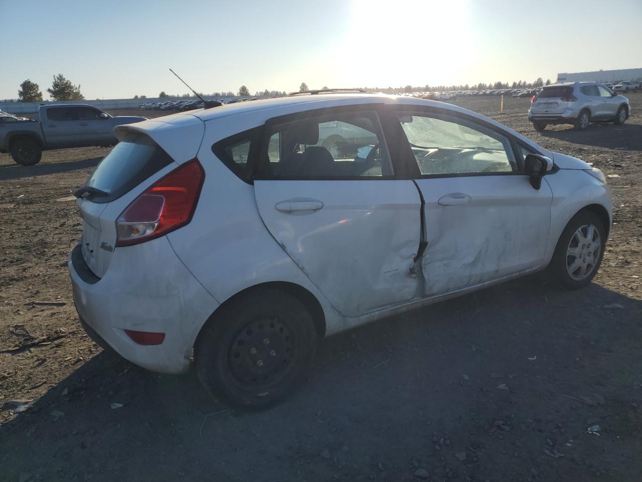 2016 Ford Fiesta VIN 3FADP4TJ2GM170172 Copart auction photo, side damage thumbnail 3