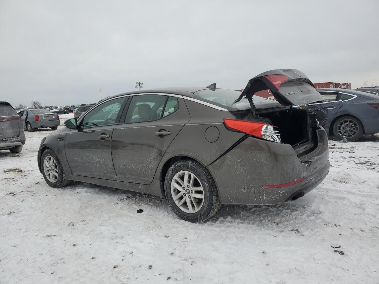 2011 KIA Optima VIN KNAGM4A77B5186922 Copart auction photo, rear end / minor dent/scratches damage thumbnail 2