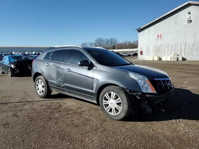 2012 Cadillac SRX VIN 3GYFNDE36CS657799 Copart auction photo, front end / side damage thumbnail 12