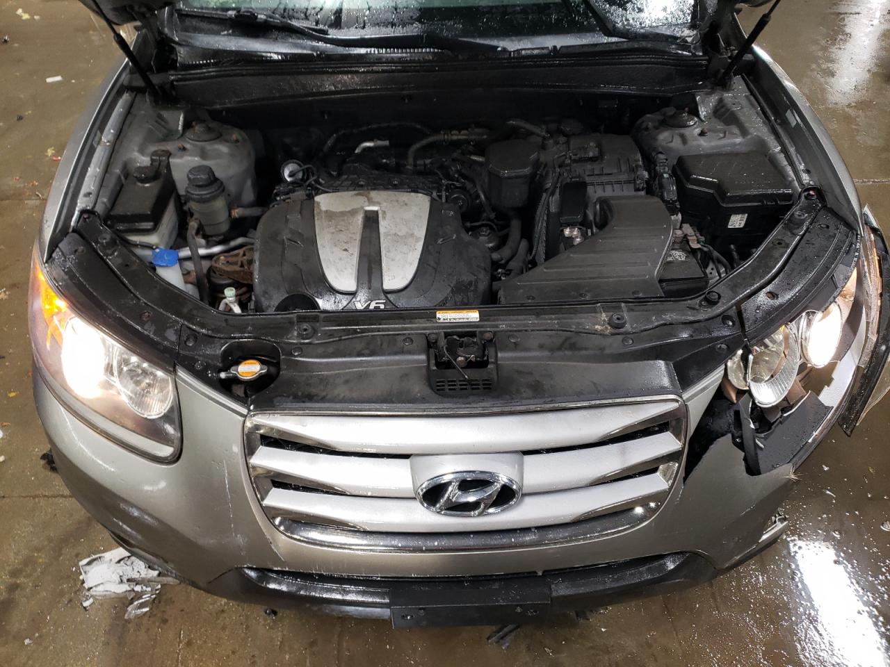 2012 Hyundai Santa Fe VIN 5XYZG4AG5CG156183 Copart auction photo, front end damage thumbnail 11