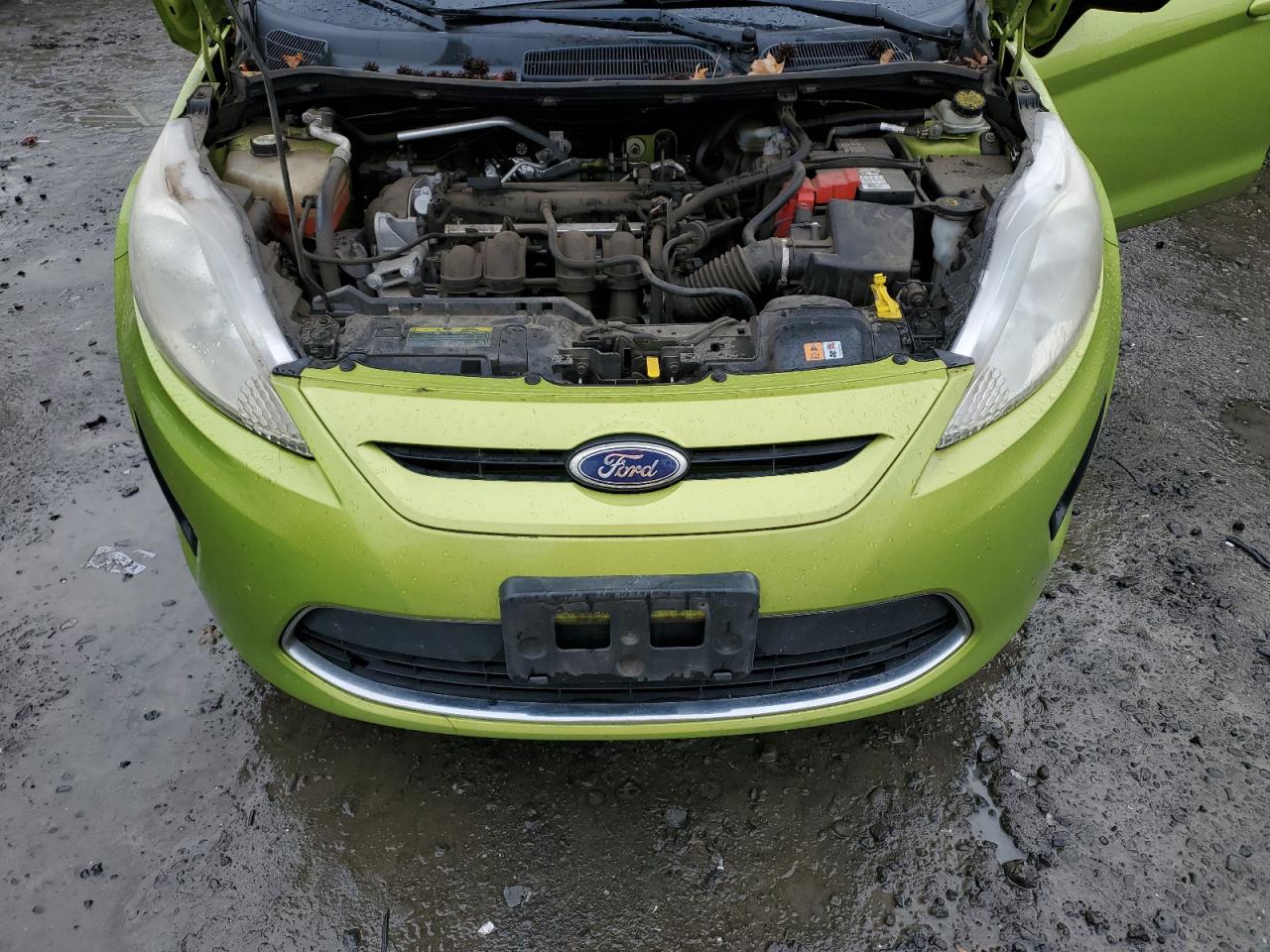 2011 Ford Fiesta VIN 3FADP4EJ7BM112080 Copart auction photo, all over damage thumbnail 11