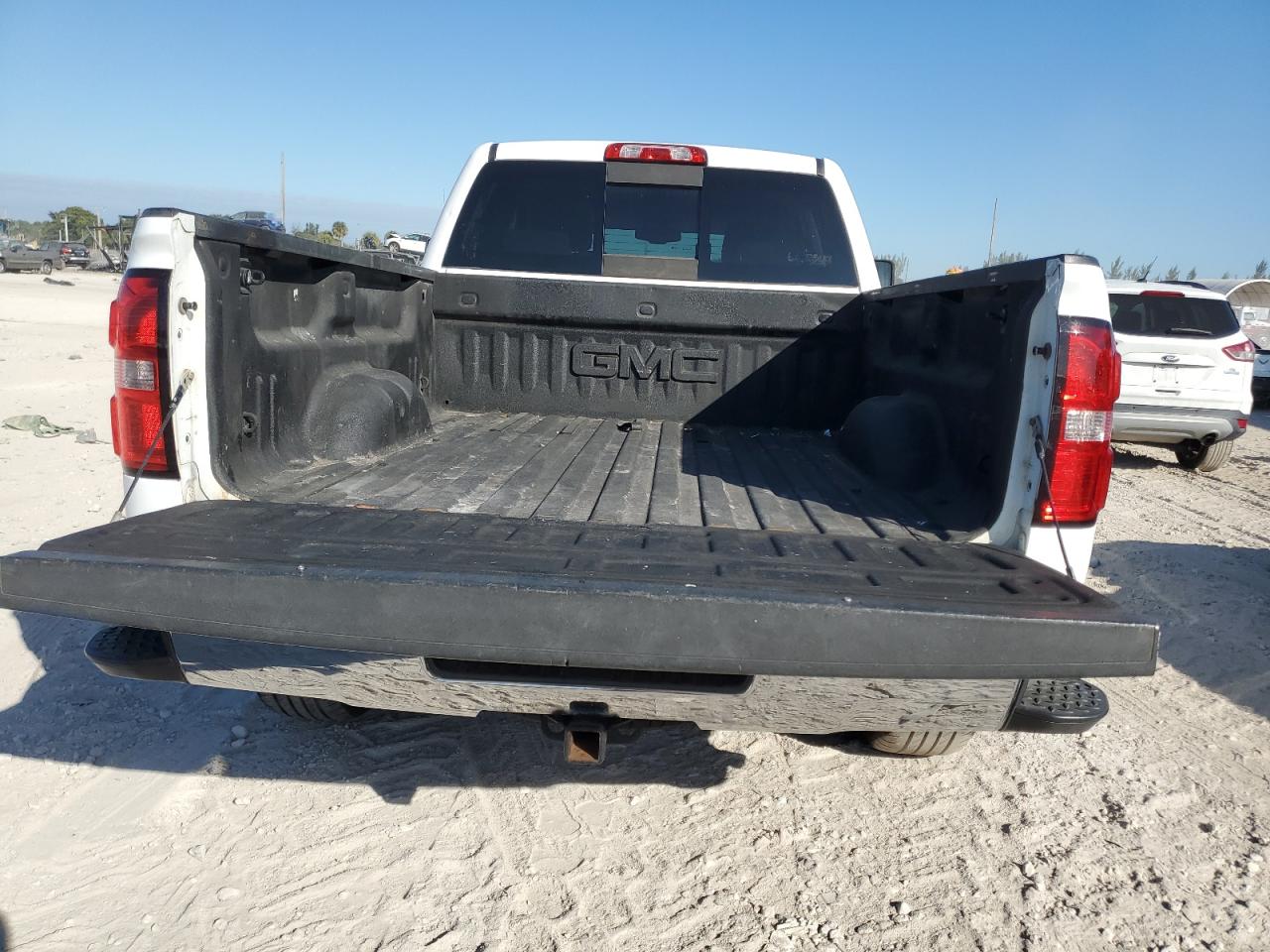2015 GMC Sierra VIN 1GTV2UEC9FZ149781 Copart auction photo, minor dent/scratches damage thumbnail 6