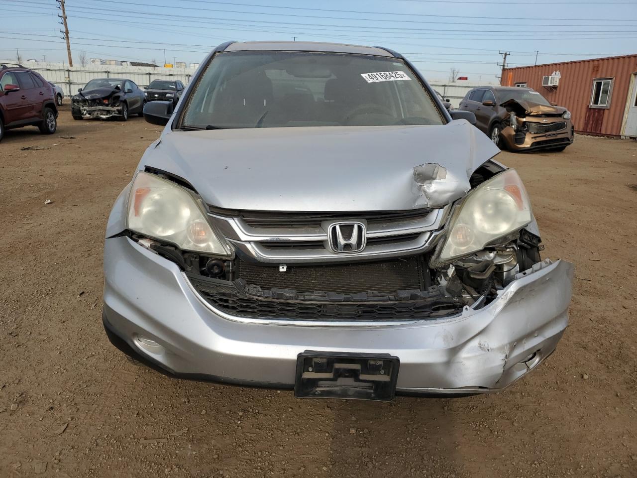 2010 Honda CR-V VIN 3CZRE4H53AG700733 Copart auction photo, front end / rear end damage thumbnail 5