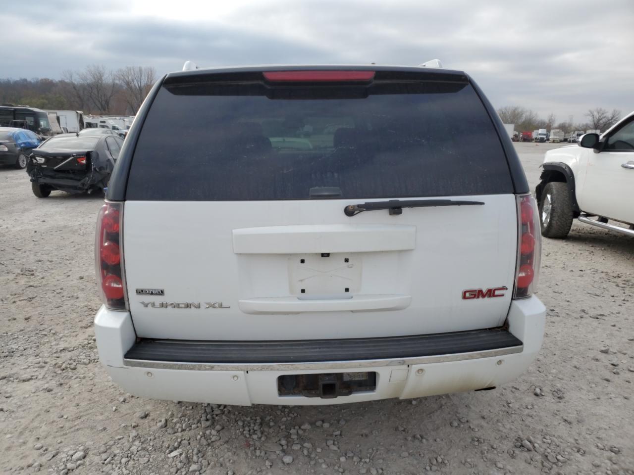 2009 GMC Yukon VIN 1GKFK06219R281011 Copart auction photo, front end / minor dent/scratches damage thumbnail 6