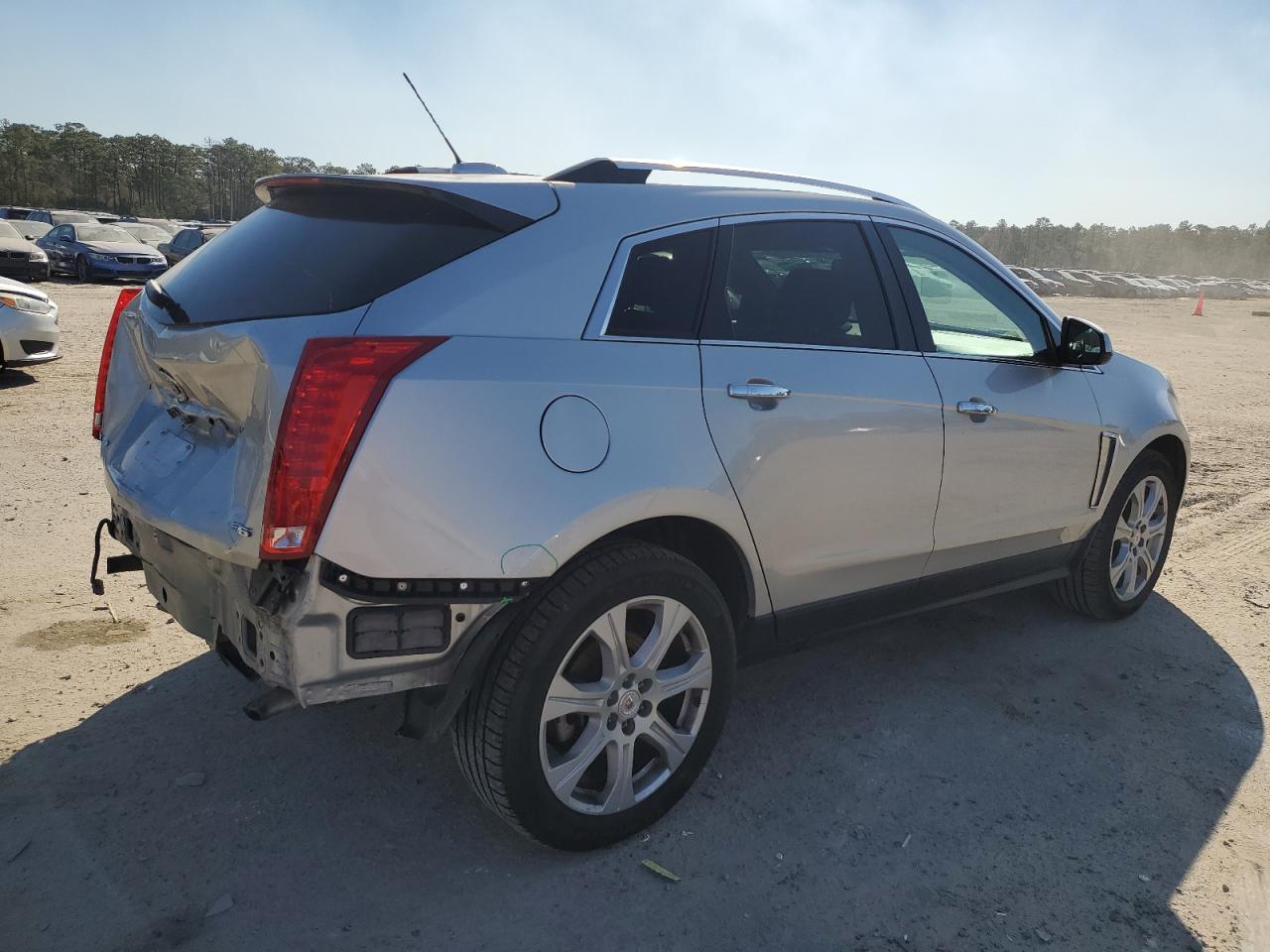 2015 Cadillac SRX VIN 3GYFNFE36FS639643 Copart auction photo, rear end damage thumbnail 3