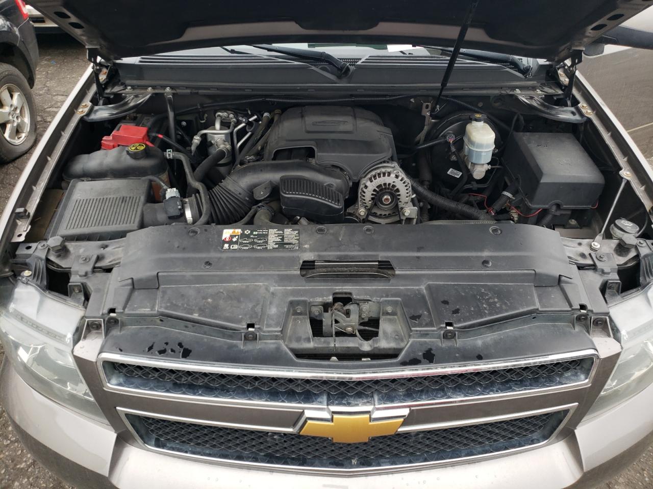 2013 Chevrolet Suburban VIN 1GNSKJE7XDR101702 Copart auction photo, all over damage thumbnail 11