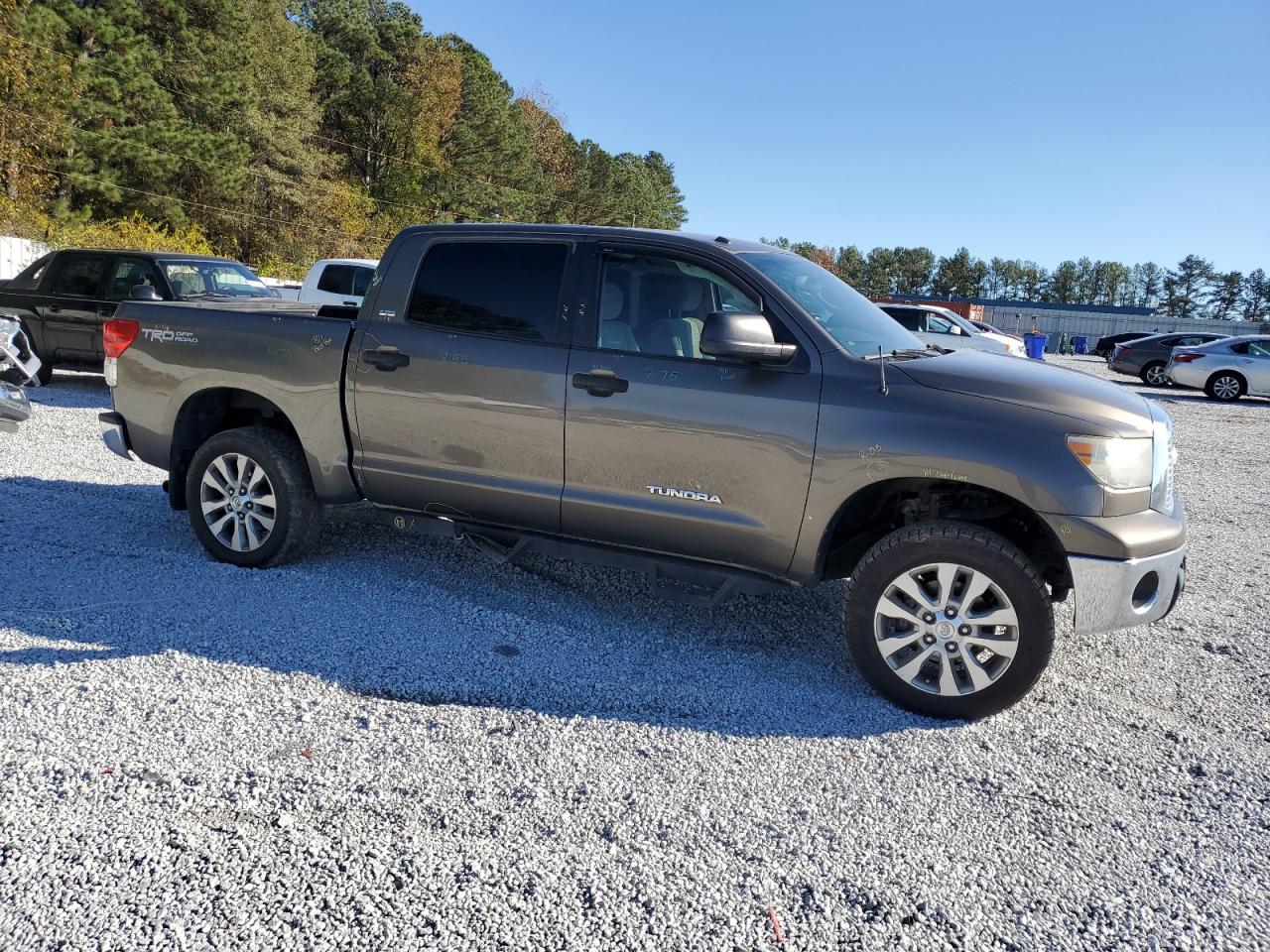 2011 Toyota Tundra VIN 5TFEM5F15BX023310 Copart auction photo, side / minor dent/scratches damage thumbnail 4
