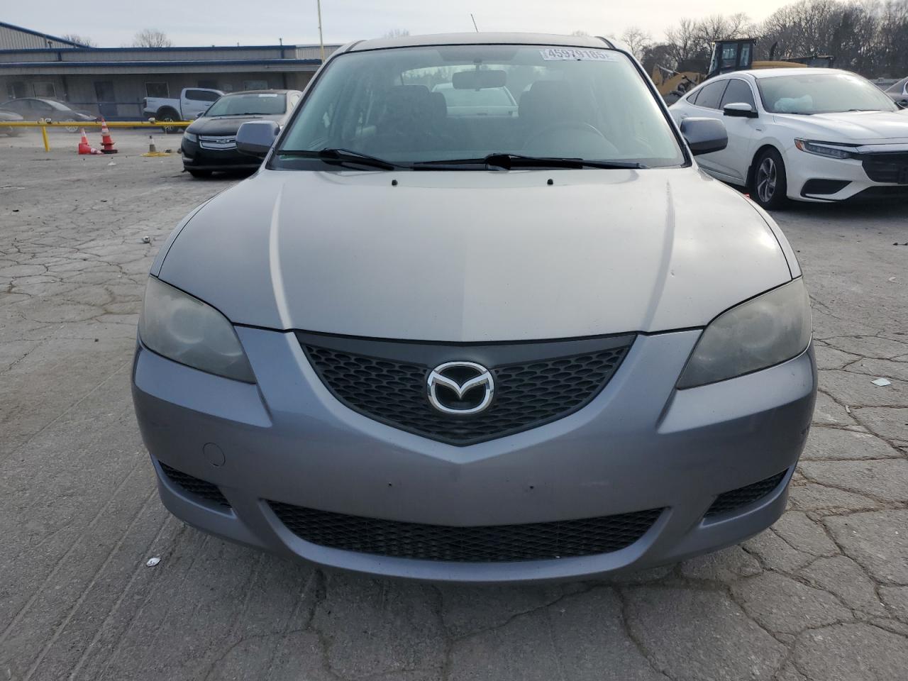 2006 Mazda 3 VIN JM1BK12F261525395 Copart auction photo, side / rear end damage thumbnail 5