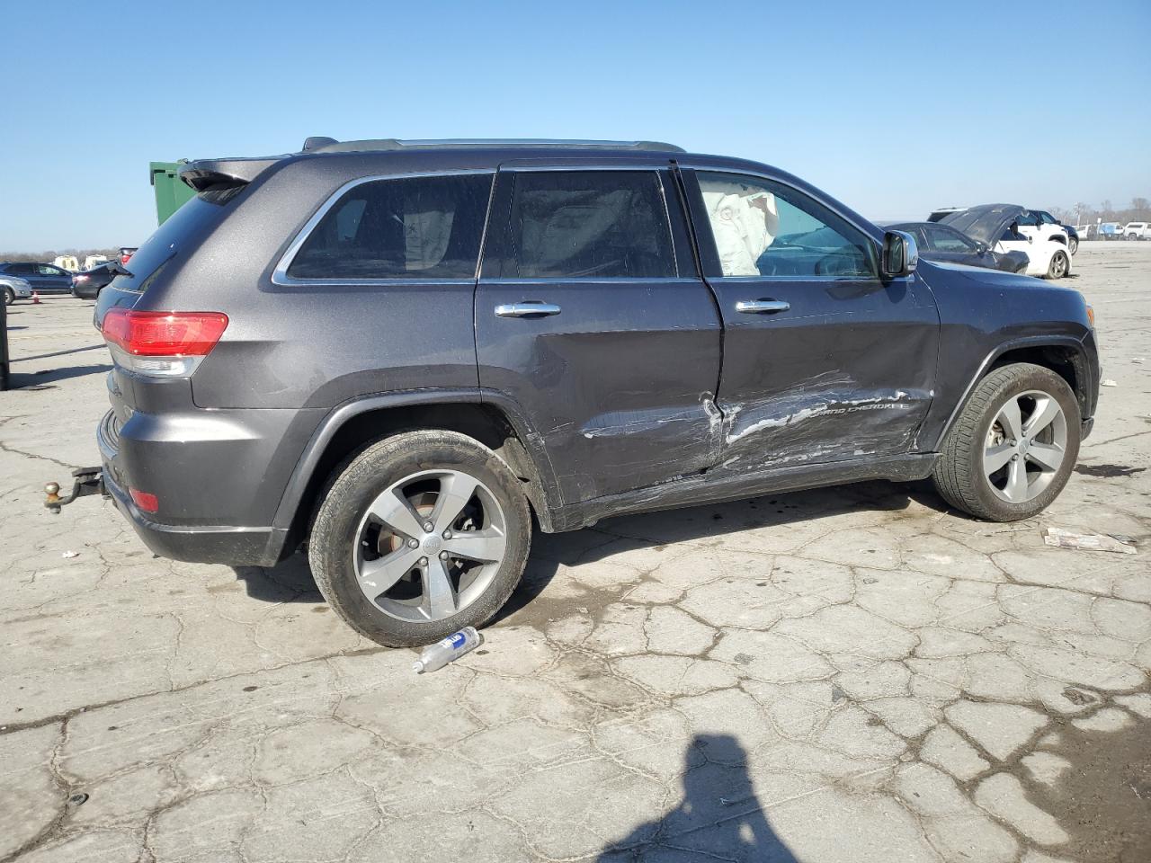 2015 Jeep Grand Cherokee VIN 1C4RJFCG5FC130573 Copart auction photo, side damage thumbnail 3