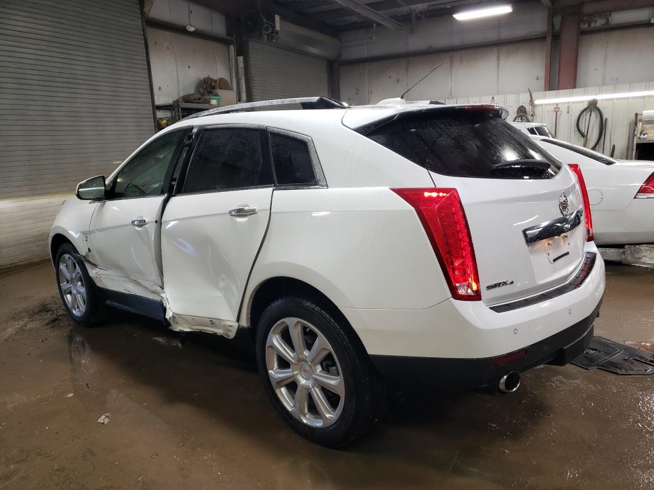2016 Cadillac SRX VIN 3GYFNCE36GS529112 Copart auction photo, side damage thumbnail 2