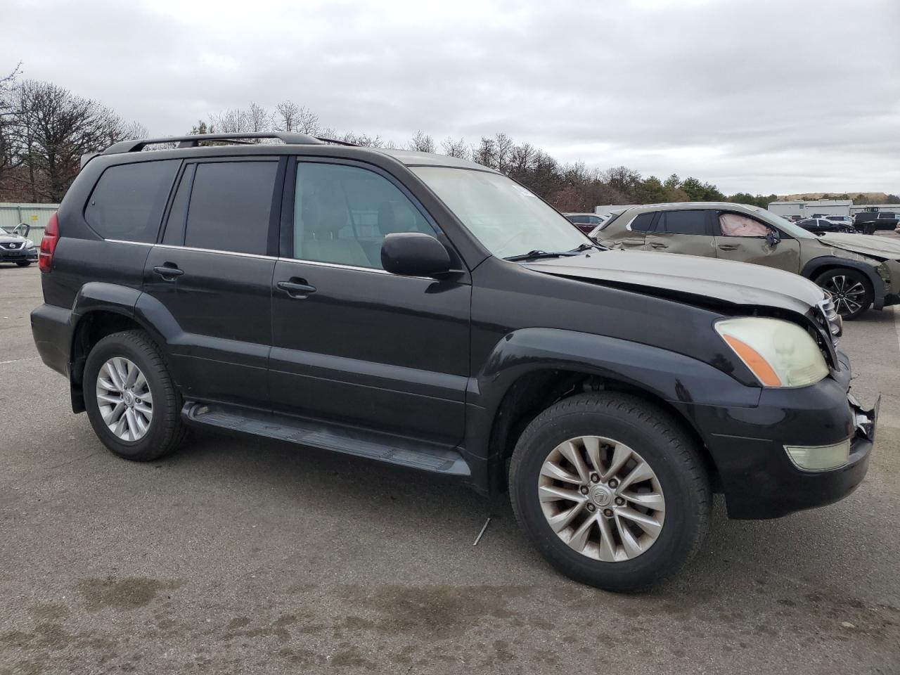 2003 Lexus GX VIN JTJBT20X130019621 Copart auction photo, front end / minor dent/scratches damage thumbnail 4